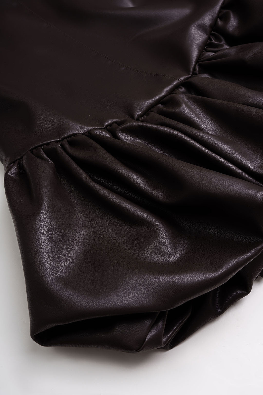 GownNovel Faux Leather Round Neck Ruched Hem Sleeveless Mini Dress