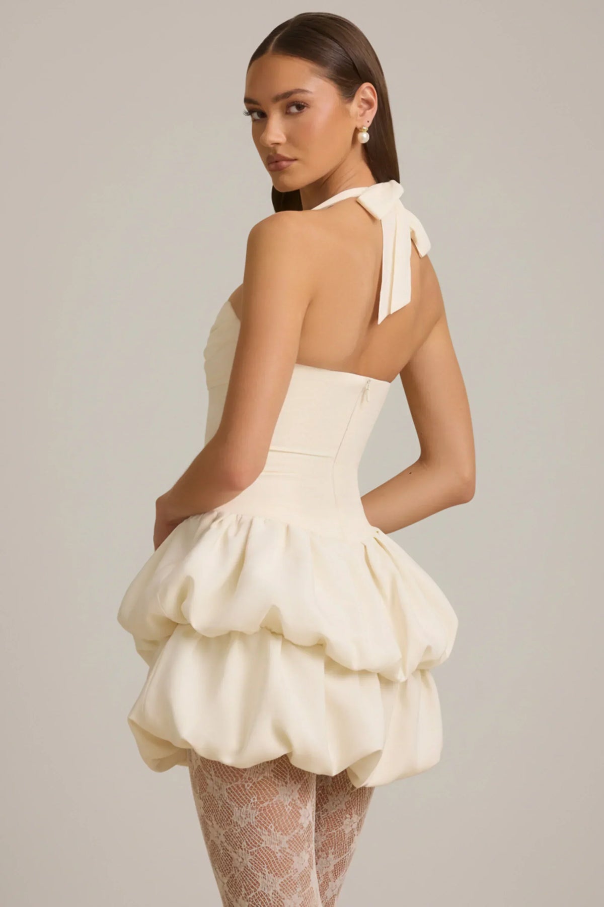 DressNovel Halterneck Layered Bubble Hem Corset Mini Dress in Ivory
