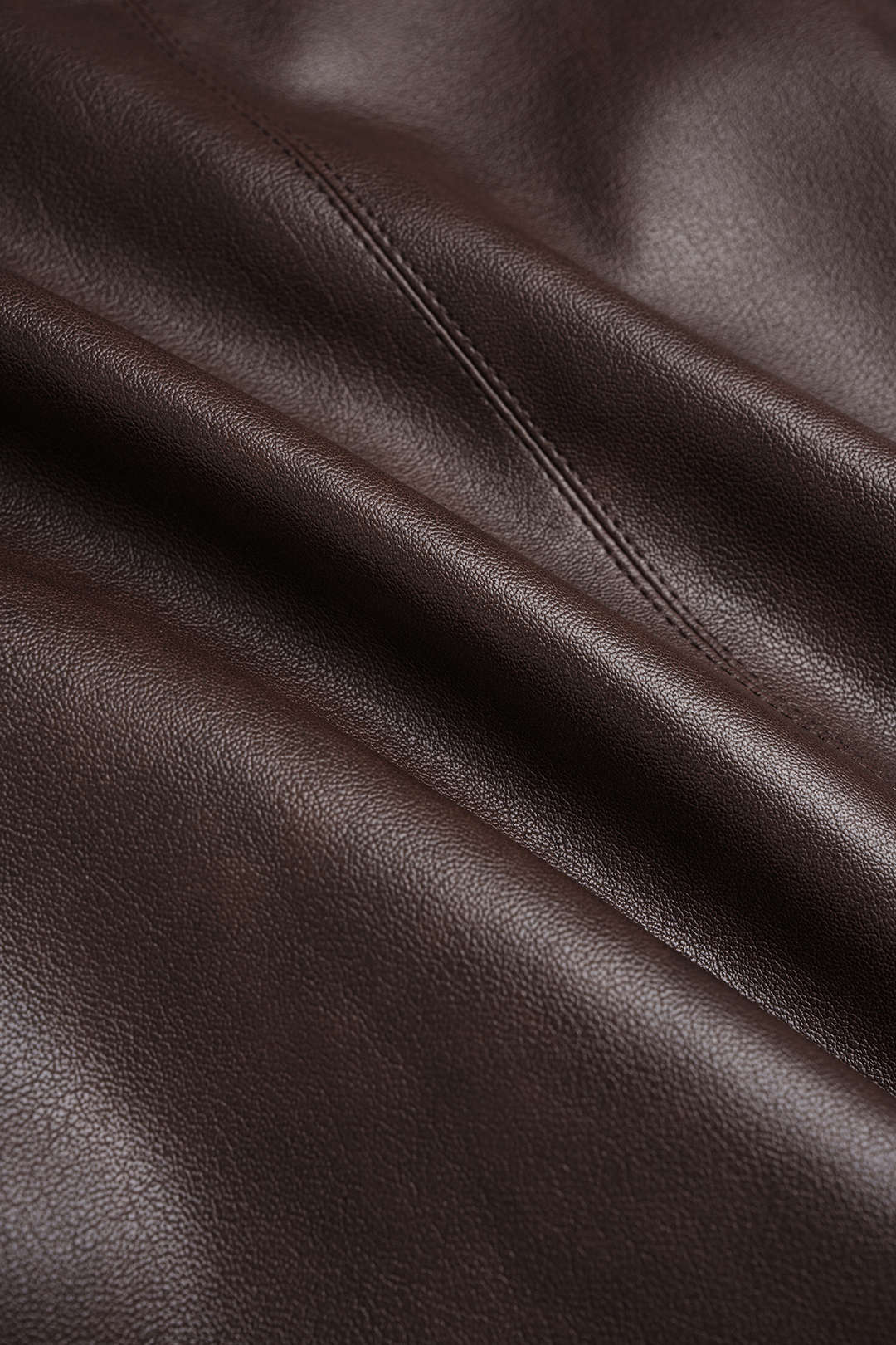 GownNovel Faux Leather Belted Mini Skirt