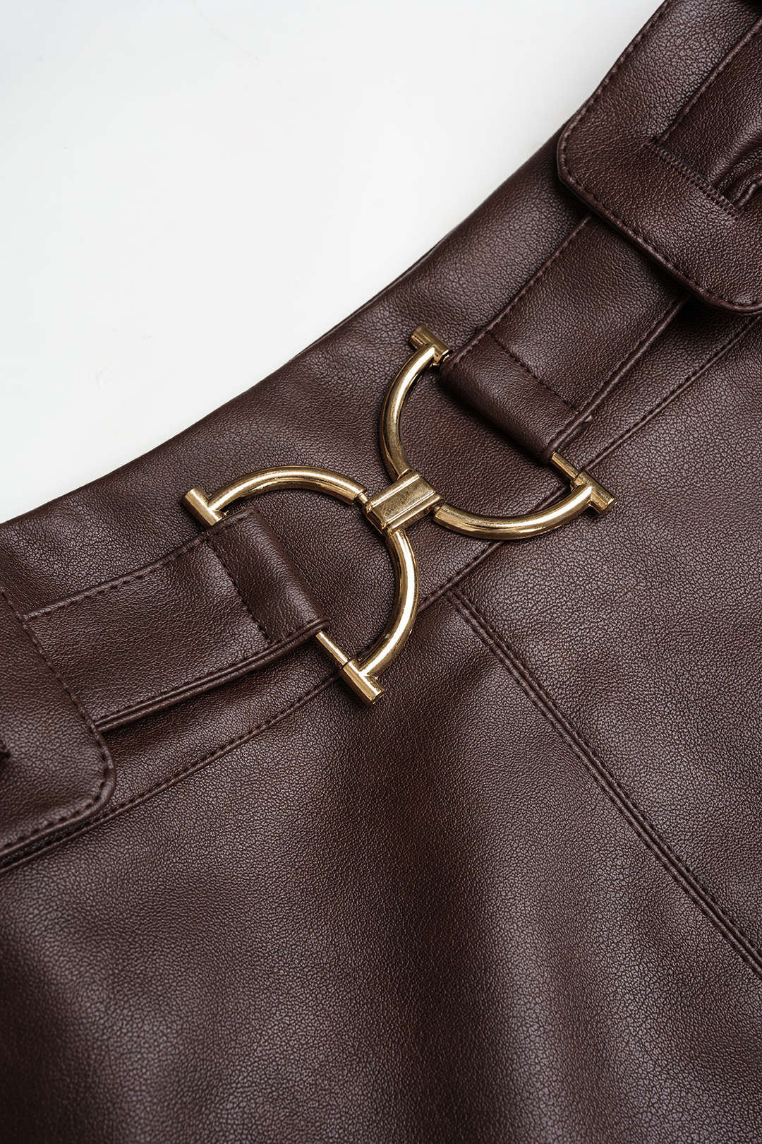 GownNovel Faux Leather Belted Mini Skirt